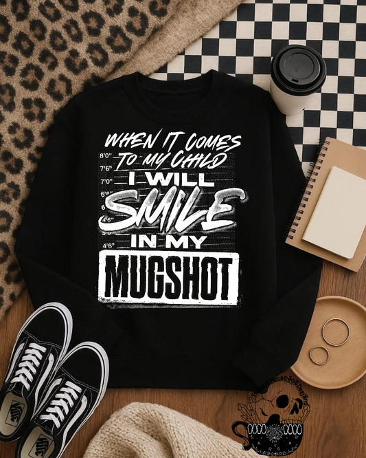 When it comes to my child I will smile in my mugshot